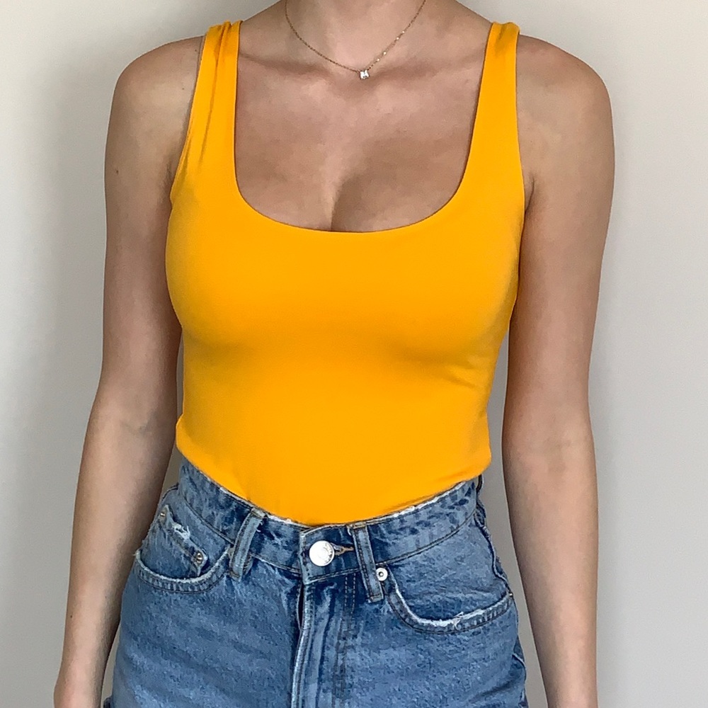 Yellow bodysuit